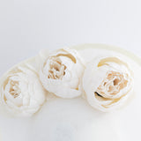 Cream large teardrop peony flower fascinator hat Cream large teardrop peony flower fascinator hat