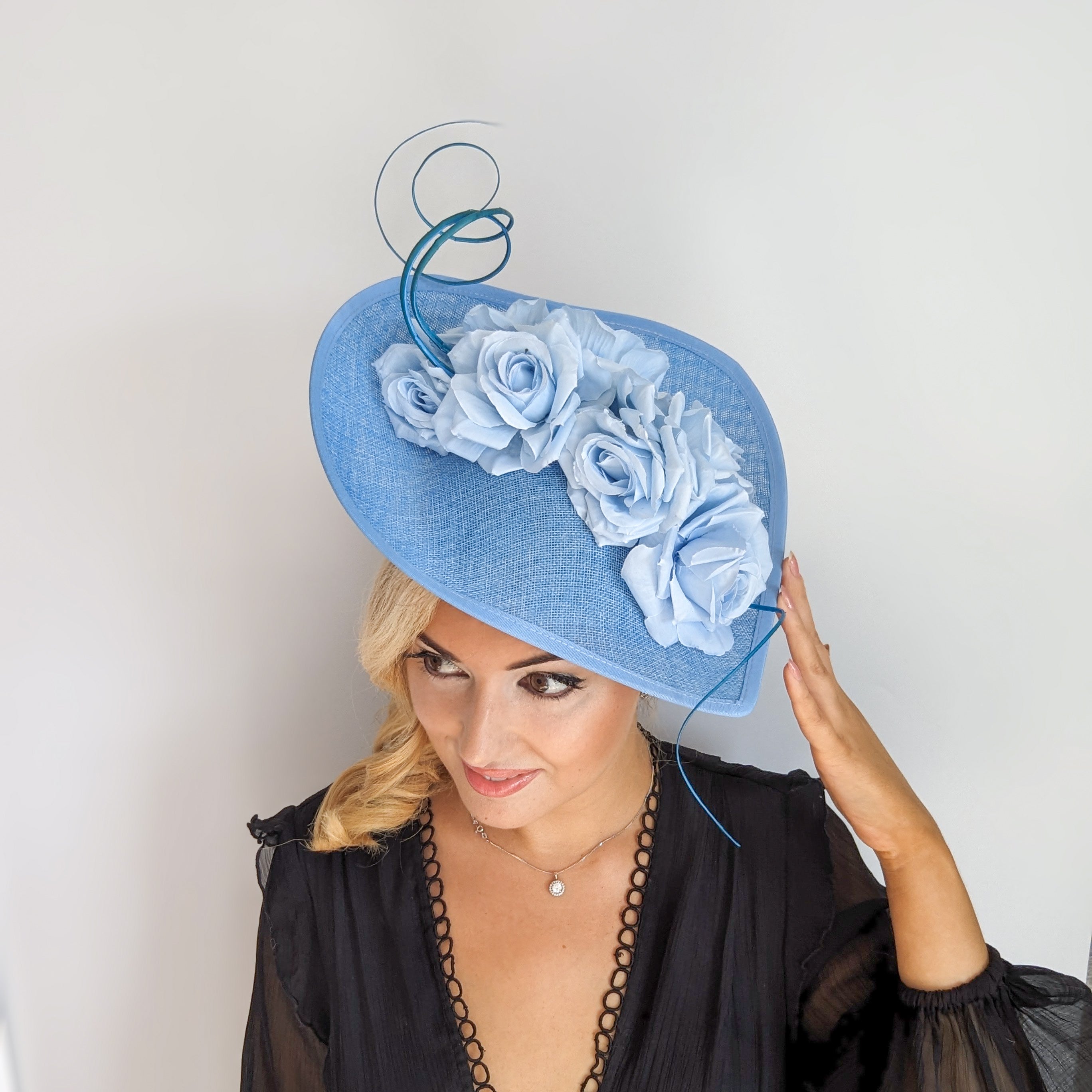 Light cornflower blue large teardrop rose flower fascinator hat Light cornflower blue large teardrop rose flower fascinator hat