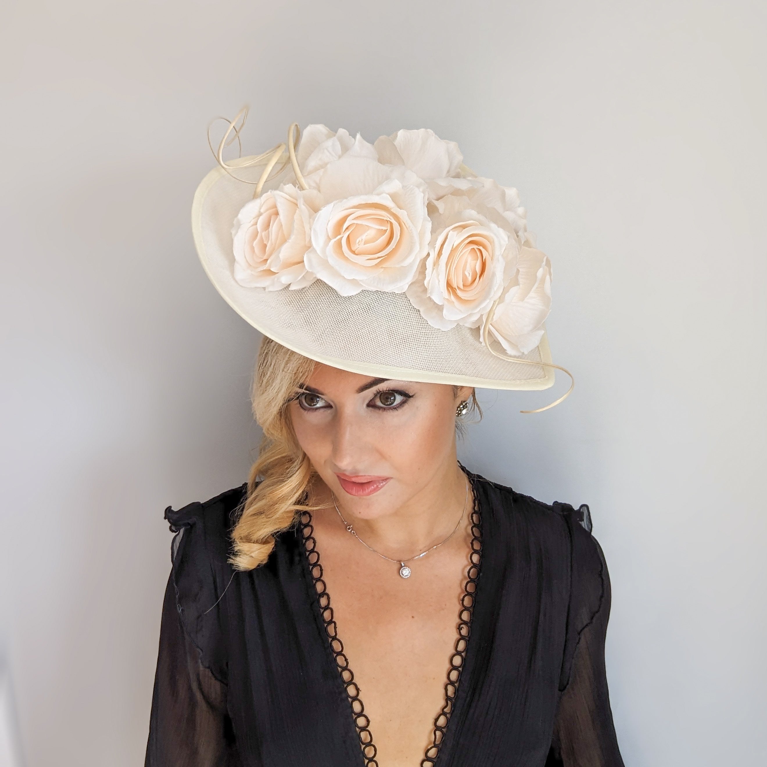 Cream large teardrop rose flower fascinator hat Cream large teardrop rose flower fascinator hat