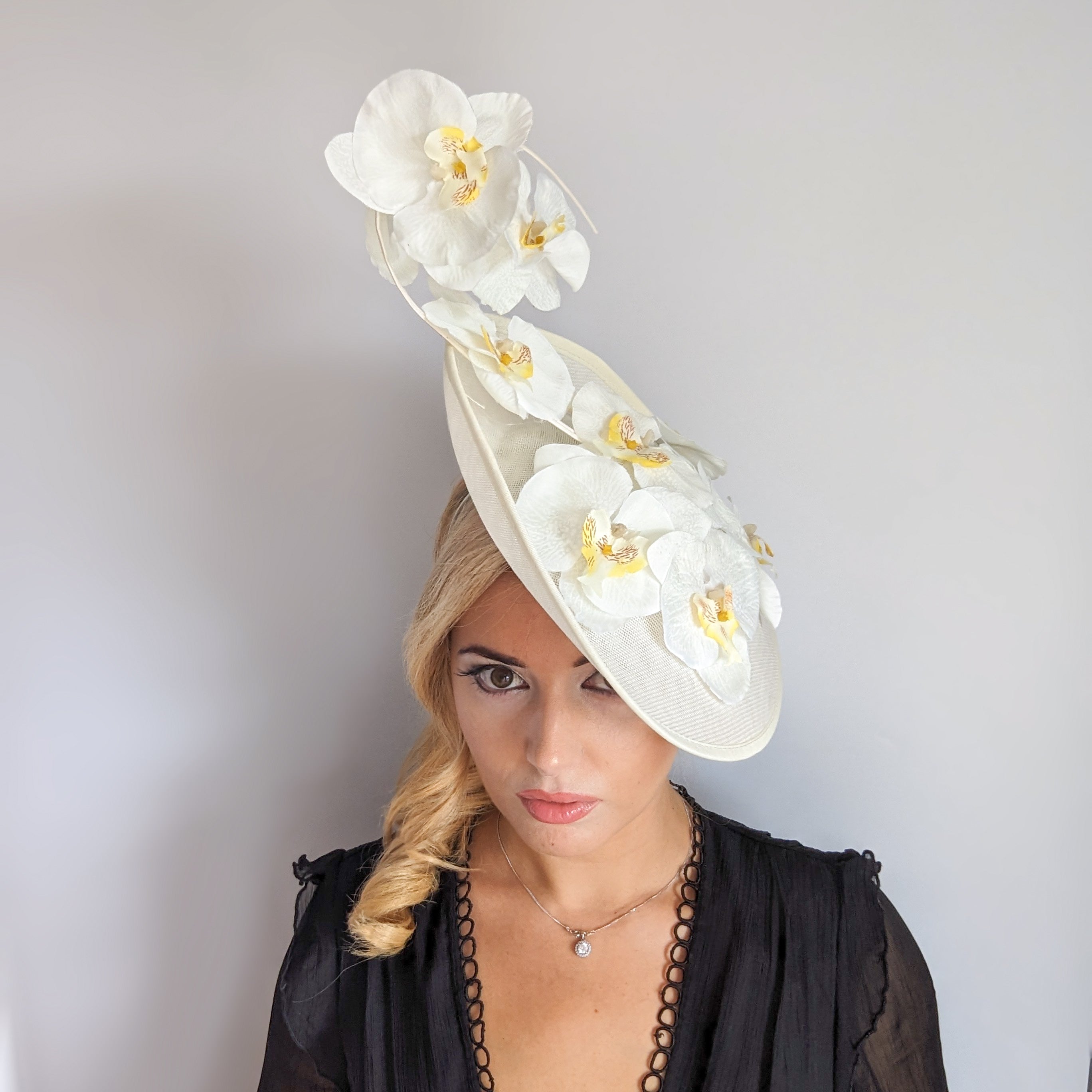 Cream large white orchid flower saucer disc fascinator hat Cream large white orchid flower saucer disc fascinator hat