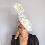 Cream large white orchid flower saucer disc fascinator hat Cream large white orchid flower saucer disc fascinator hat