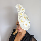Cream large white orchid flower saucer disc fascinator hat Cream large white orchid flower saucer disc fascinator hat