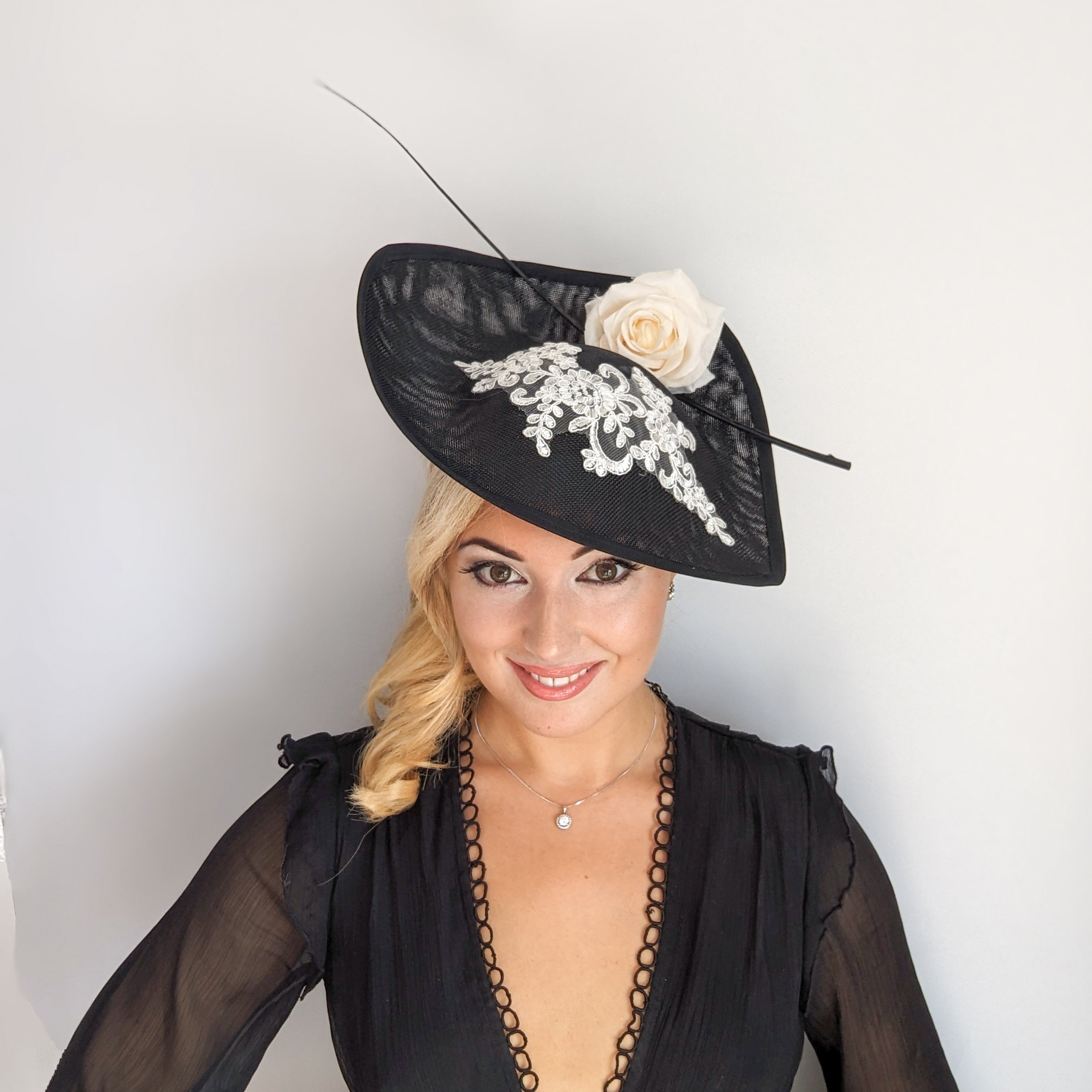 Black white large teardrop rose flower fascinator hat Black white large teardrop rose flower fascinator hat