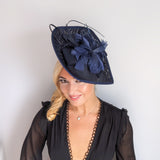 Navy blue large teardrop feather fascinator hat Navy blue large teardrop feather fascinator hat