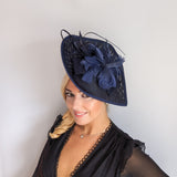 Navy blue large teardrop feather fascinator hat Navy blue large teardrop feather fascinator hat