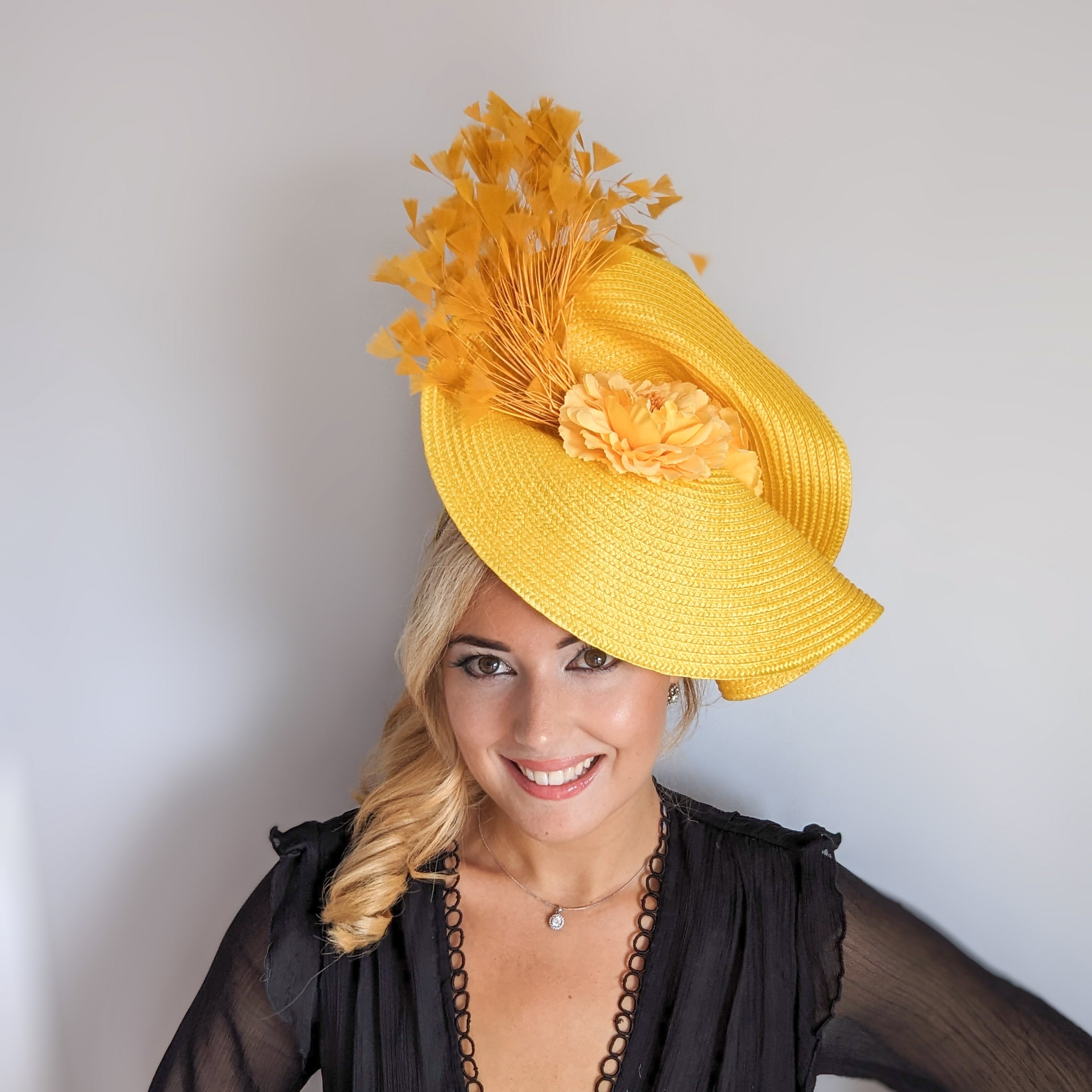Yellow large woven straw flower feather fascinator hat Yellow large woven straw flower feather fascinator hat