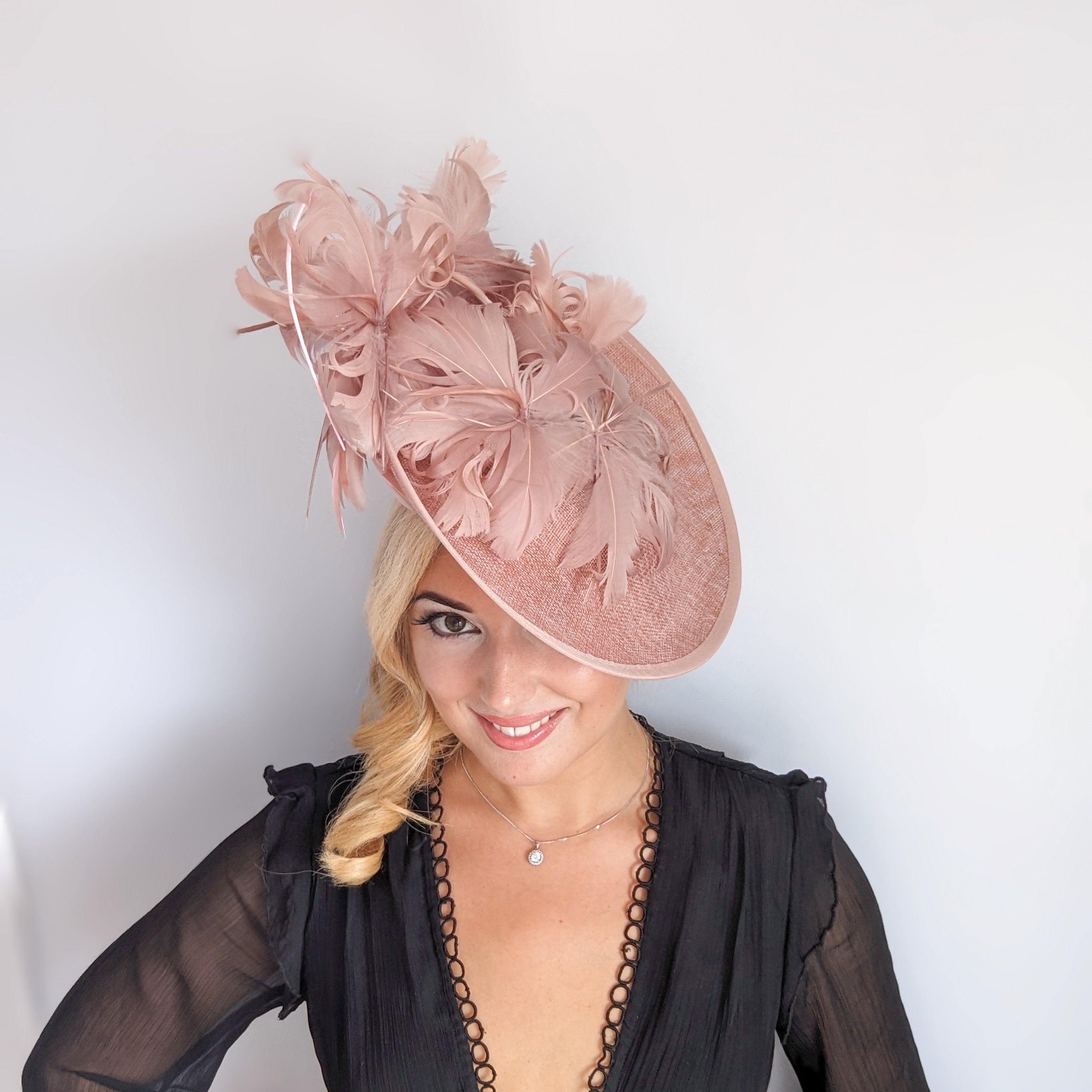 Blush pink large feather saucer disc fascinator hat Blush pink large feather saucer disc fascinator hat