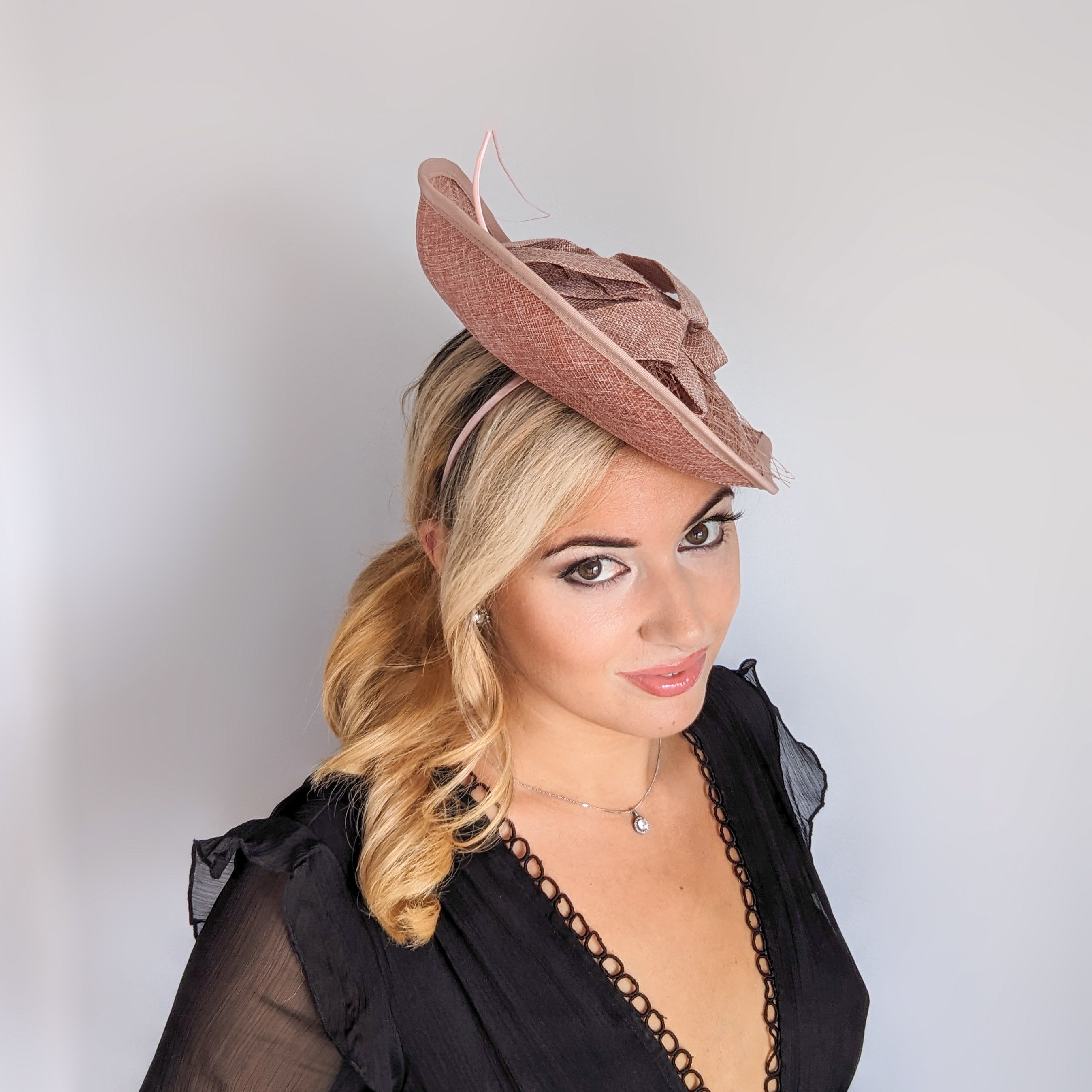 Blush pink large teardrop flower feather fascinator hat Blush pink large teardrop flower feather fascinator hat