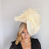 Cream large woven straw flower feather fascinator hat Cream large woven straw flower feather fascinator hat