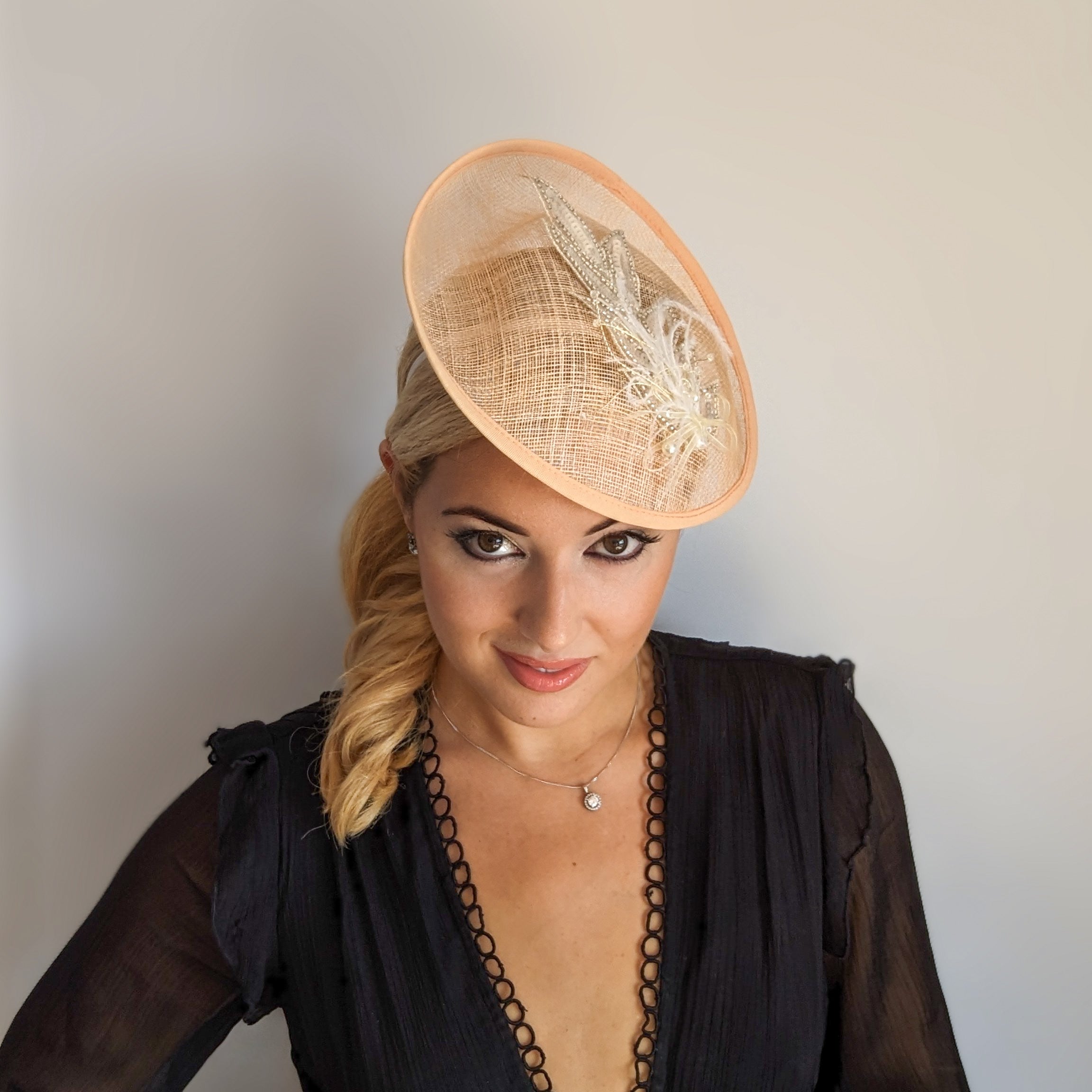 Peach crystal feather disc saucer fascinator hat Peach crystal feather disc saucer fascinator hat