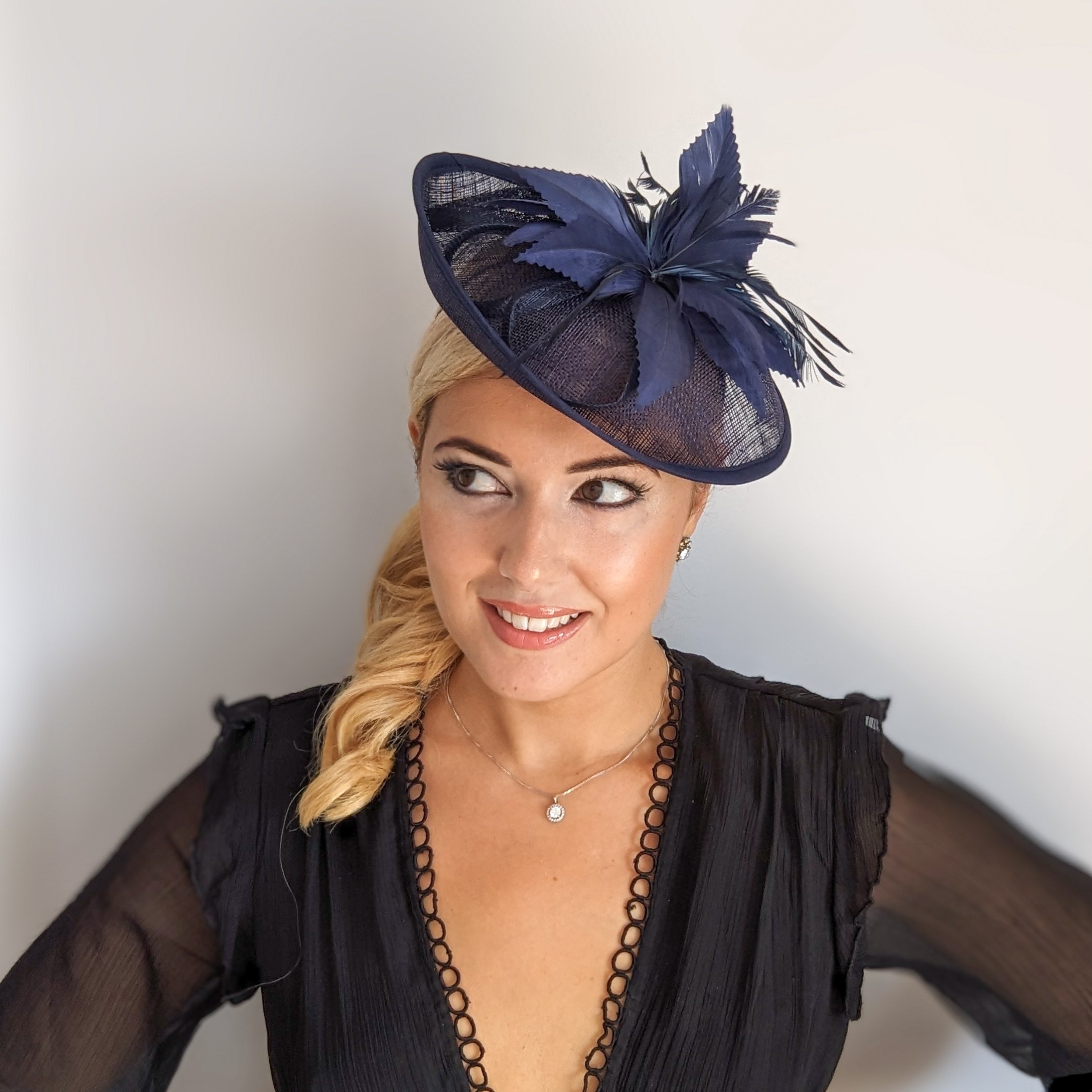 Navy blue feather disc saucer fascinator hat Navy blue feather disc saucer fascinator hat
