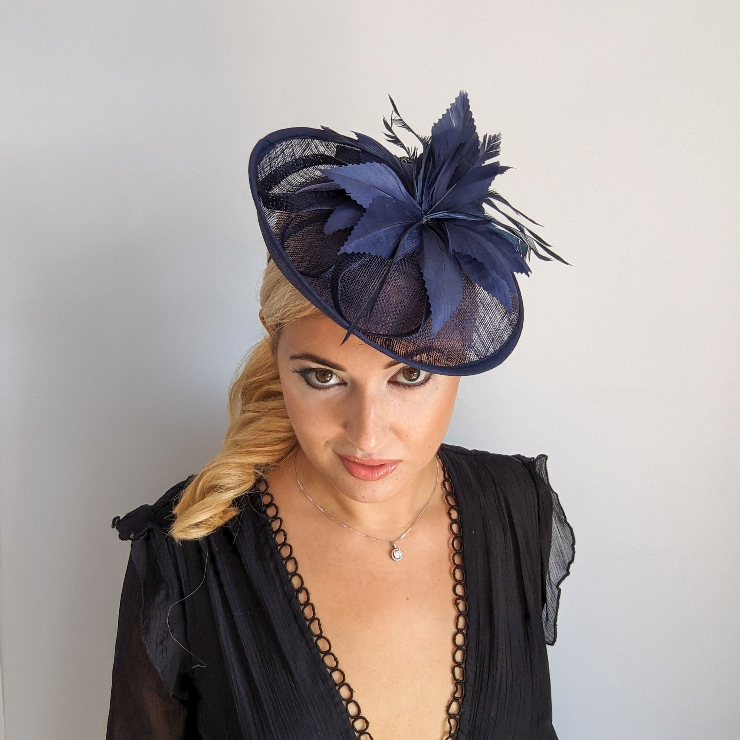 Navy blue feather disc saucer fascinator hat Navy blue feather disc saucer fascinator hat