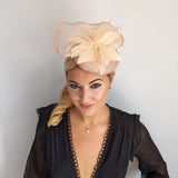 Light peach pink pearl feather fascinator hat Light peach pink pearl feather fascinator hat