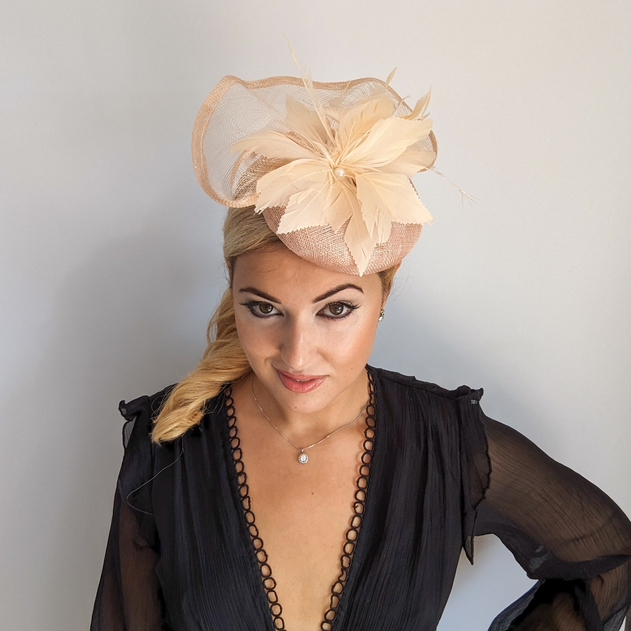 Light peach pink pearl feather fascinator hat Light peach pink pearl feather fascinator hat