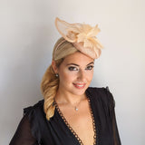 Light peach pink pearl feather fascinator hat Light peach pink pearl feather fascinator hat