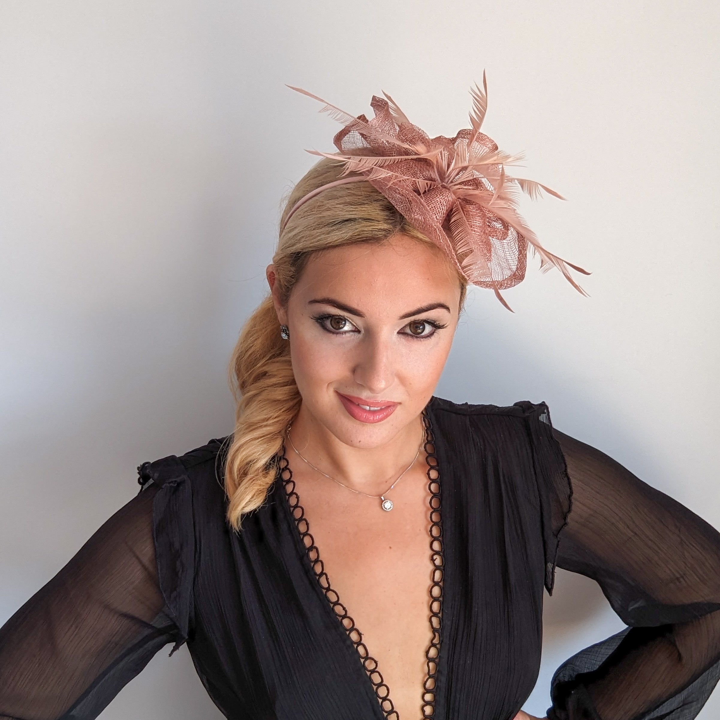 Dusty rose pink feather fascinator hat Dusty rose pink feather fascinator hat