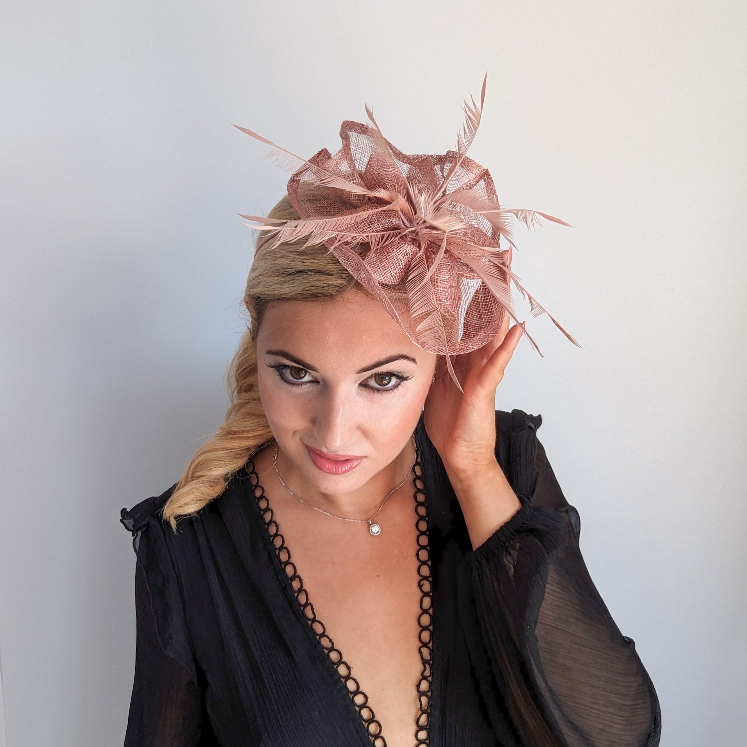 Dusty rose pink feather fascinator hat Dusty rose pink feather fascinator hat