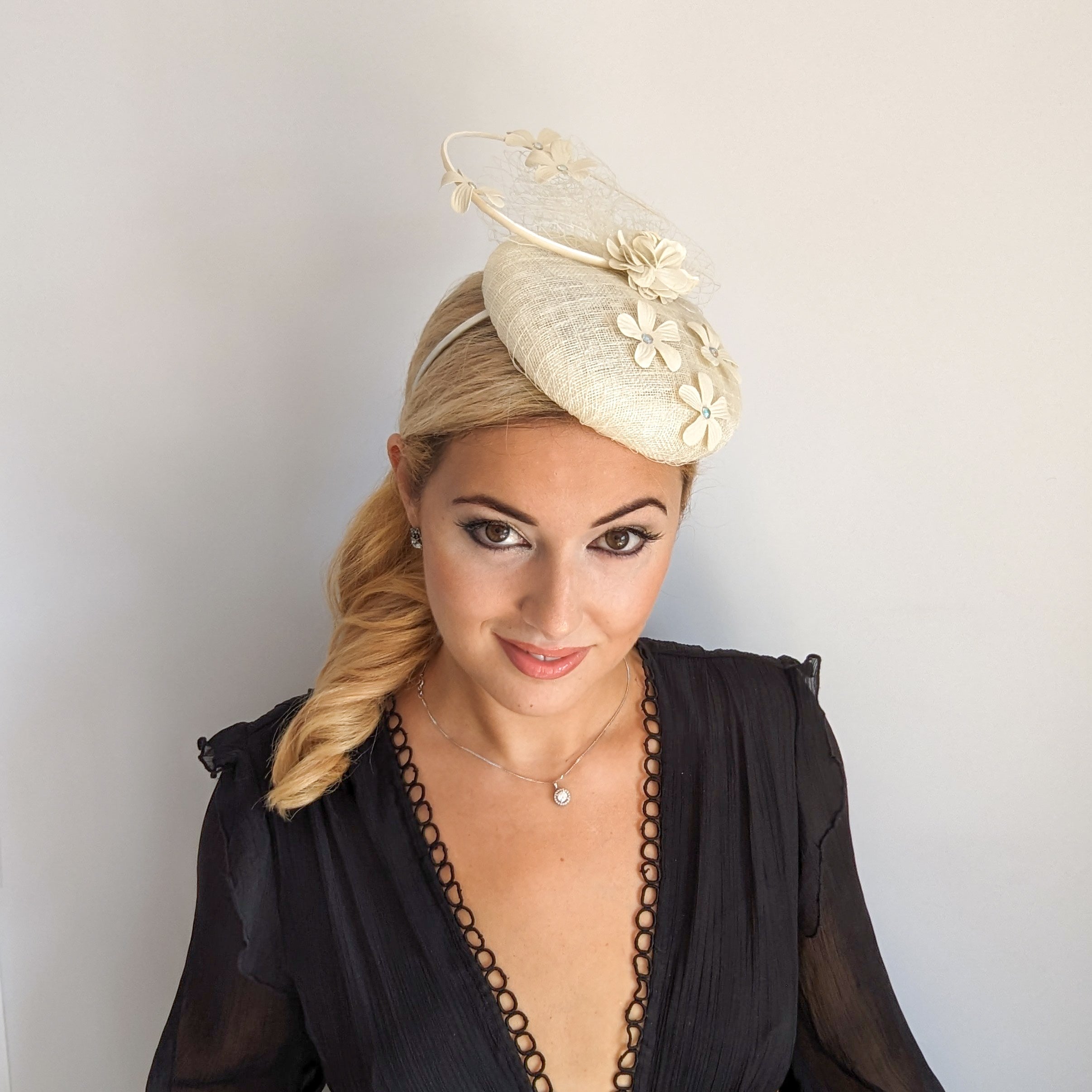 Cream flower fascinator hat Cream flower fascinator hat