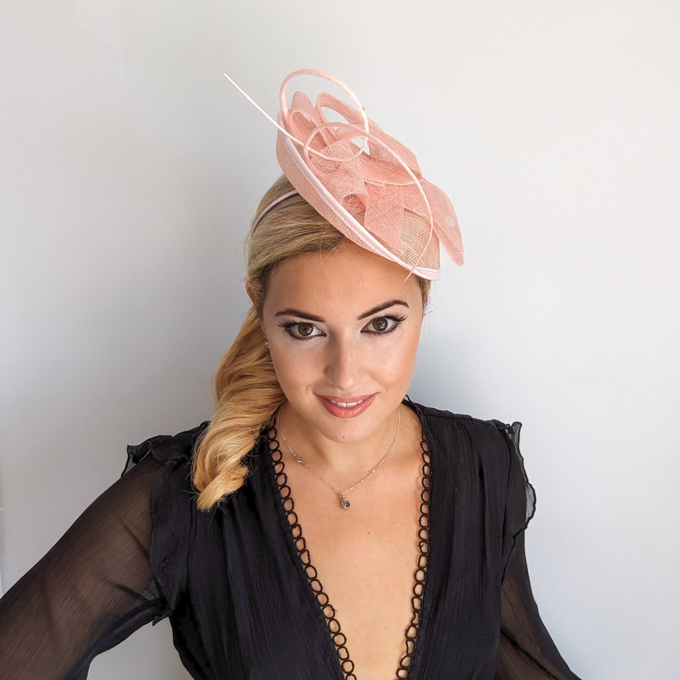 Light pink disc saucer fascinator hat Light pink disc saucer fascinator hat