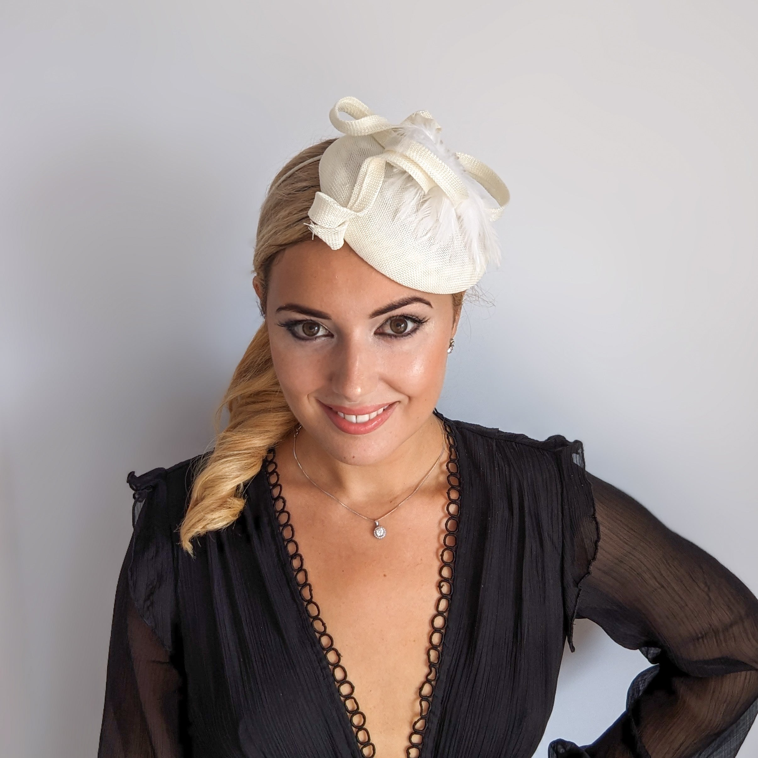 Cream crystal feather fascinator hat Cream crystal feather fascinator hat