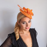 Orange flower fascinator disc saucer hat Orange flower fascinator disc saucer hat