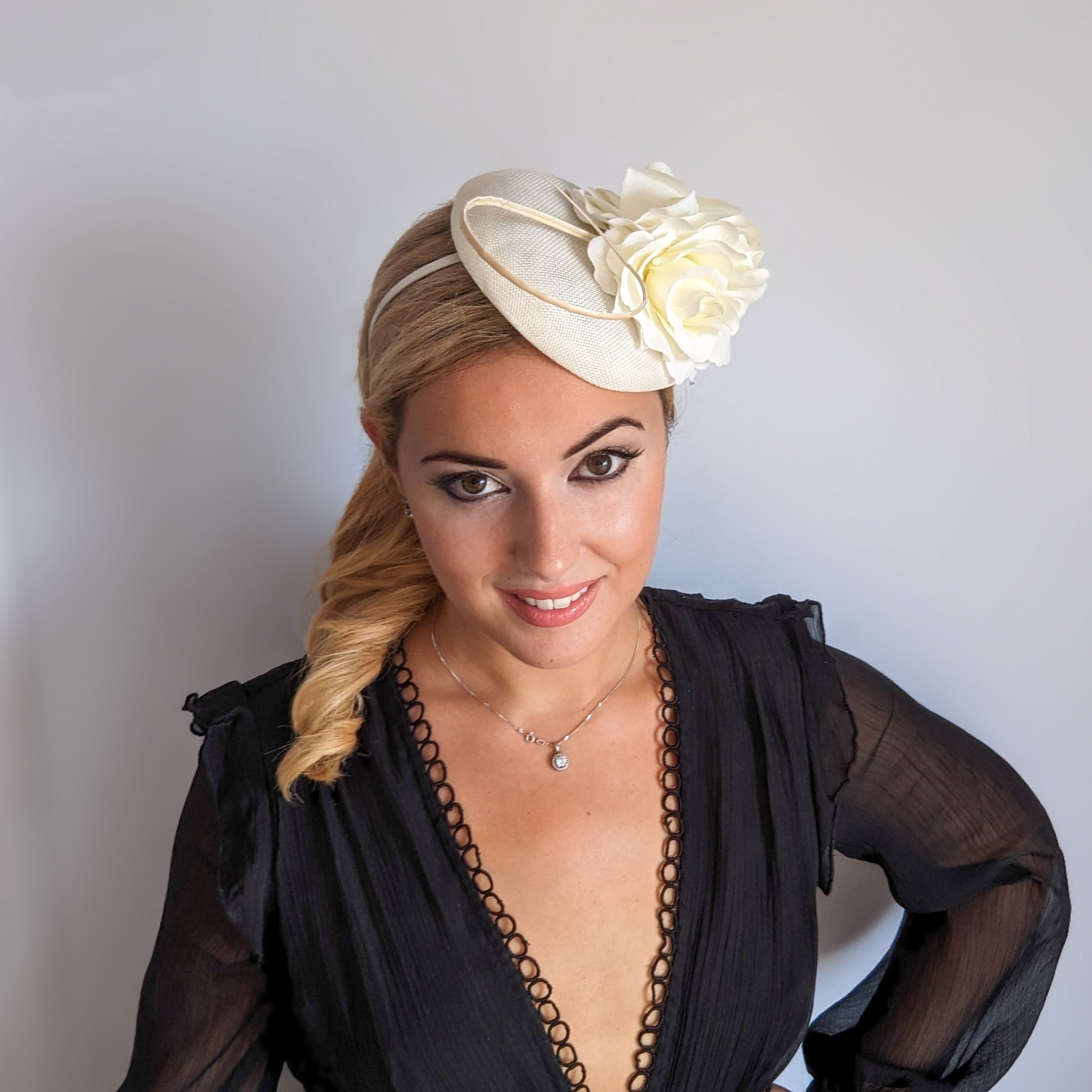 Cream rose flower fascinator hat Cream rose flower fascinator hat