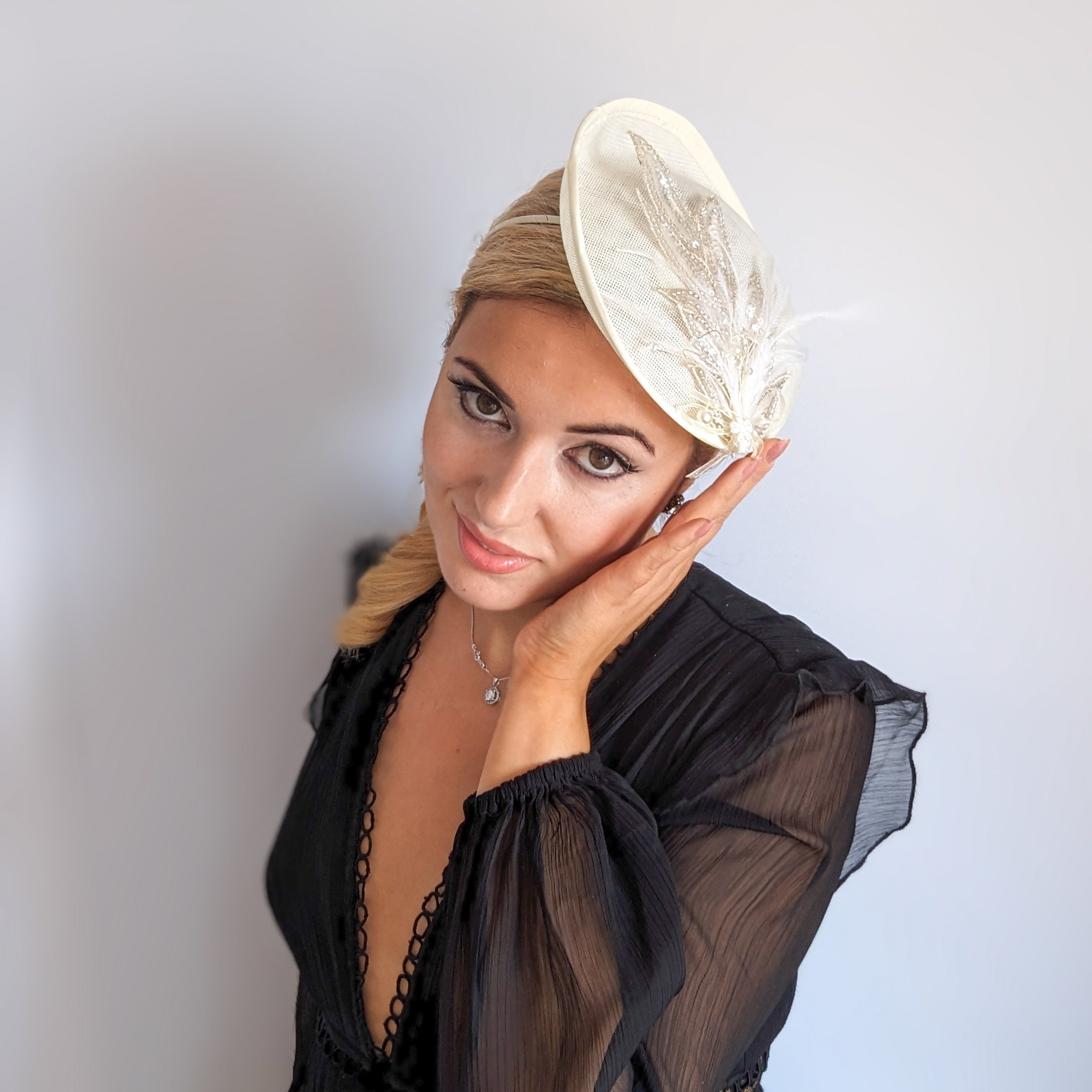 Cream crystal feather disc saucer fascinator hat Cream crystal feather disc saucer fascinator hat