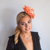Large peach satin rose fascinator hat Large peach satin rose fascinator hat
