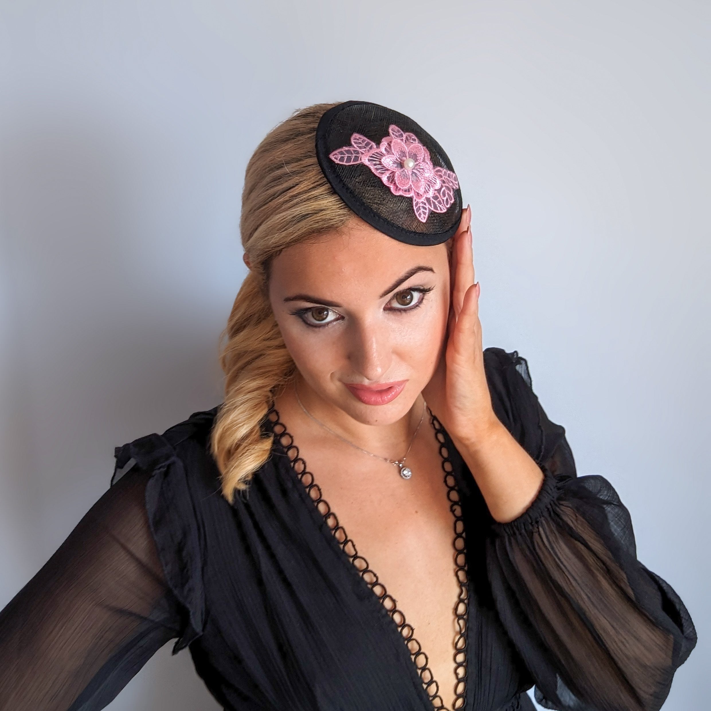 Black pink lace small fascinator hat Black pink lace small fascinator hat