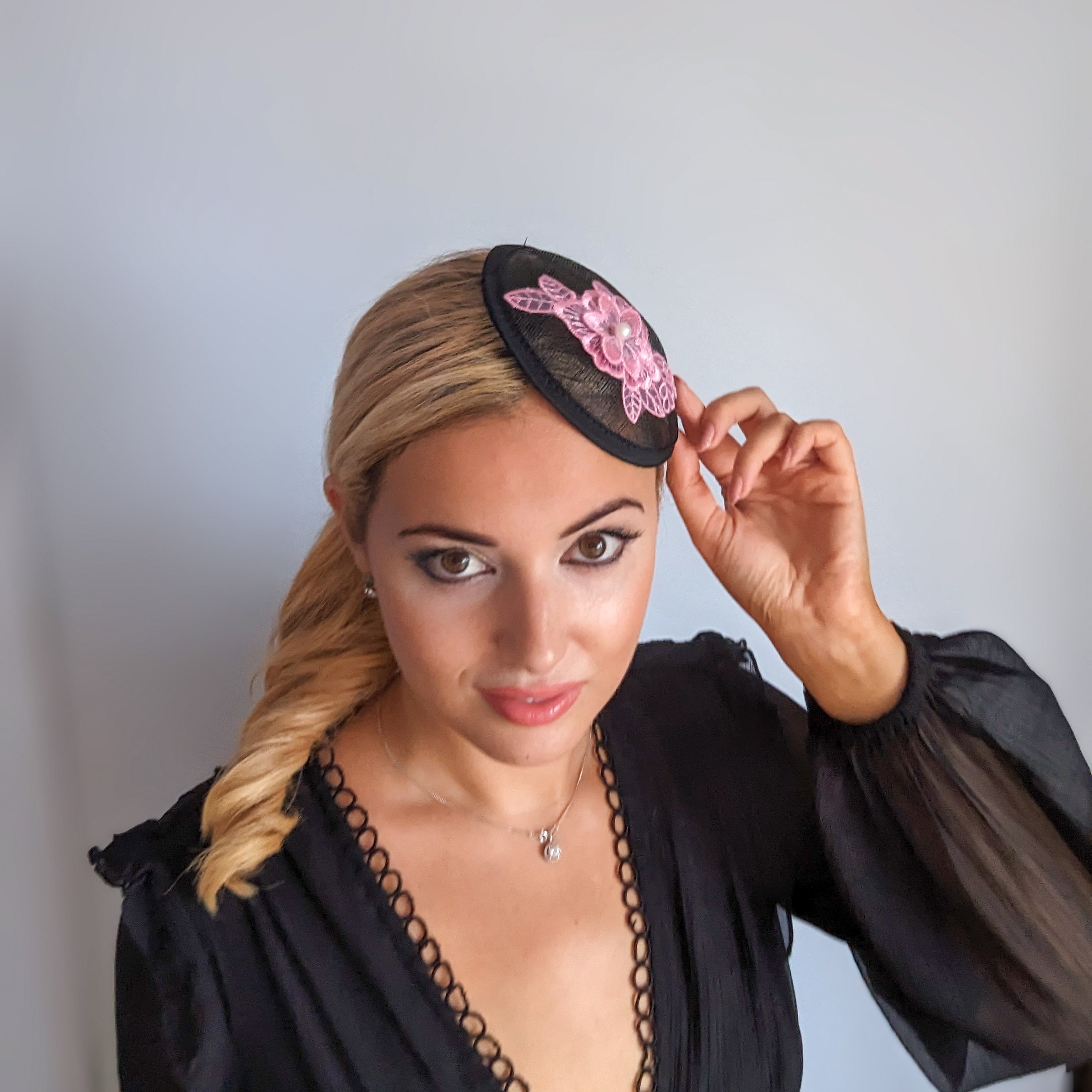 Black pink lace small fascinator hat Black pink lace small fascinator hat