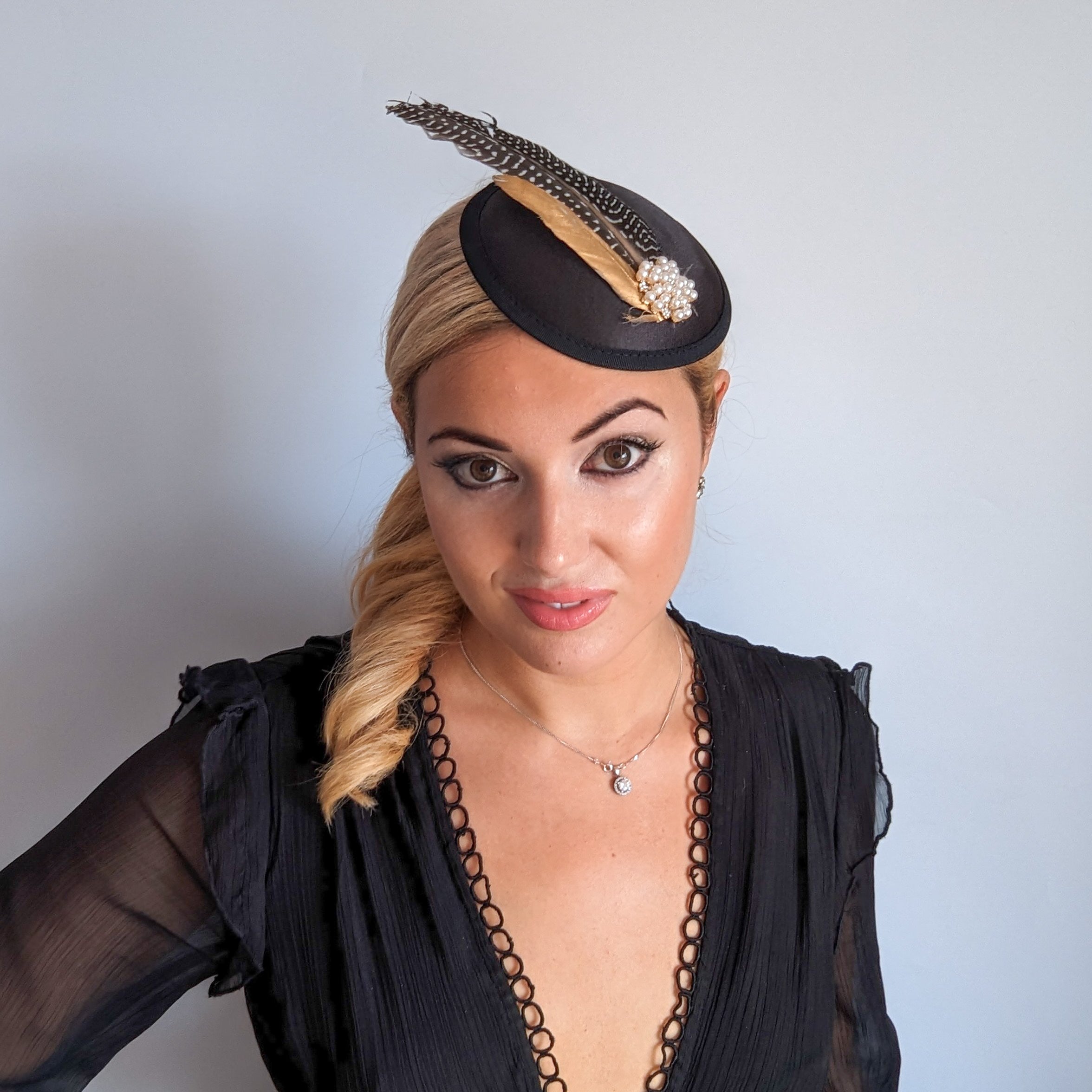 Black pheasant feather small satin fascinator  wedding hats uk Black pheasant feather small satin fascinator  wedding hats uk