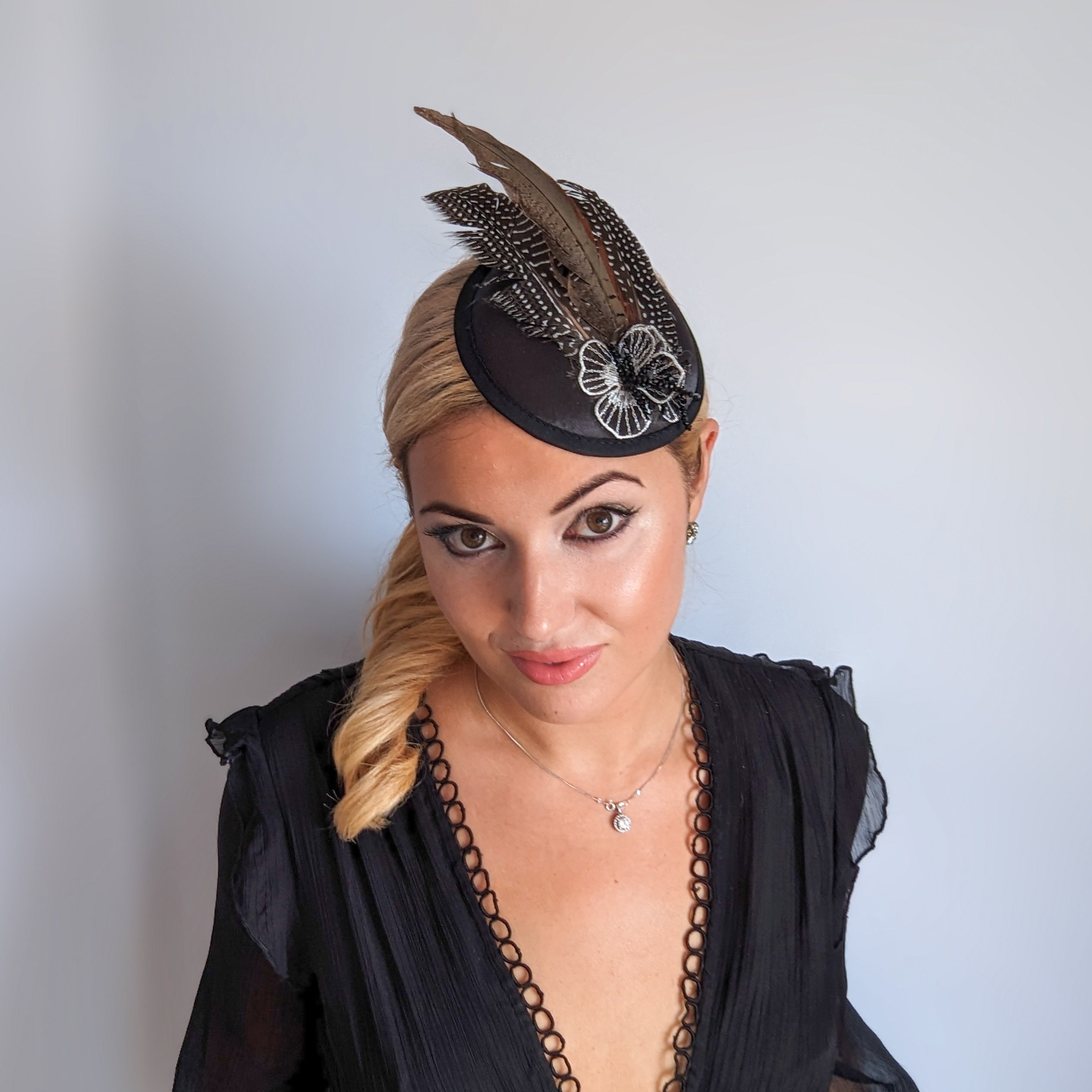 Black pheasant feather small satin fascinator  wedding hats uk Black pheasant feather small satin fascinator  wedding hats uk