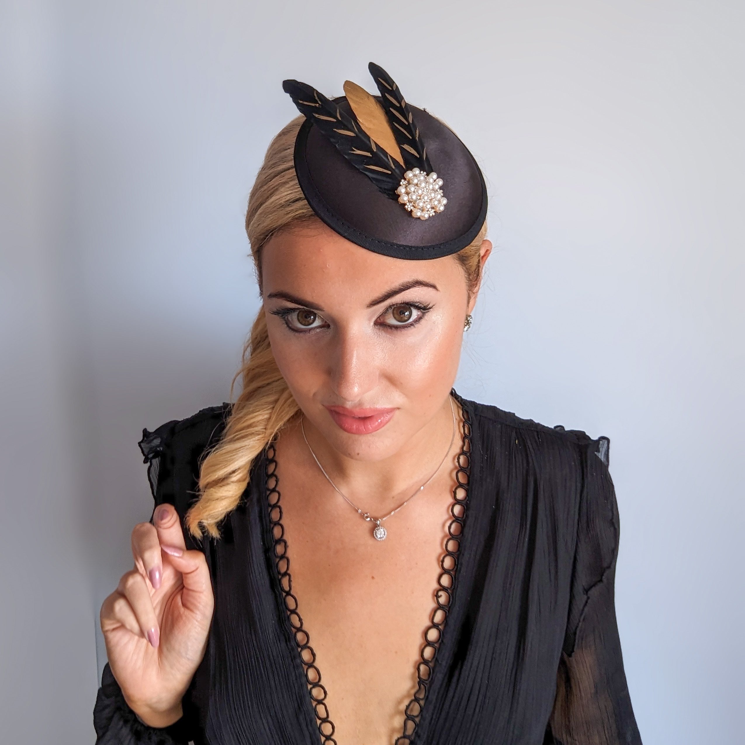 Black gold feather small satin fascinator  wedding hats uk Black gold feather small satin fascinator  wedding hats uk