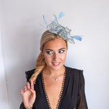 Aquamarine blue feather fascinator hat Aquamarine blue feather fascinator hat