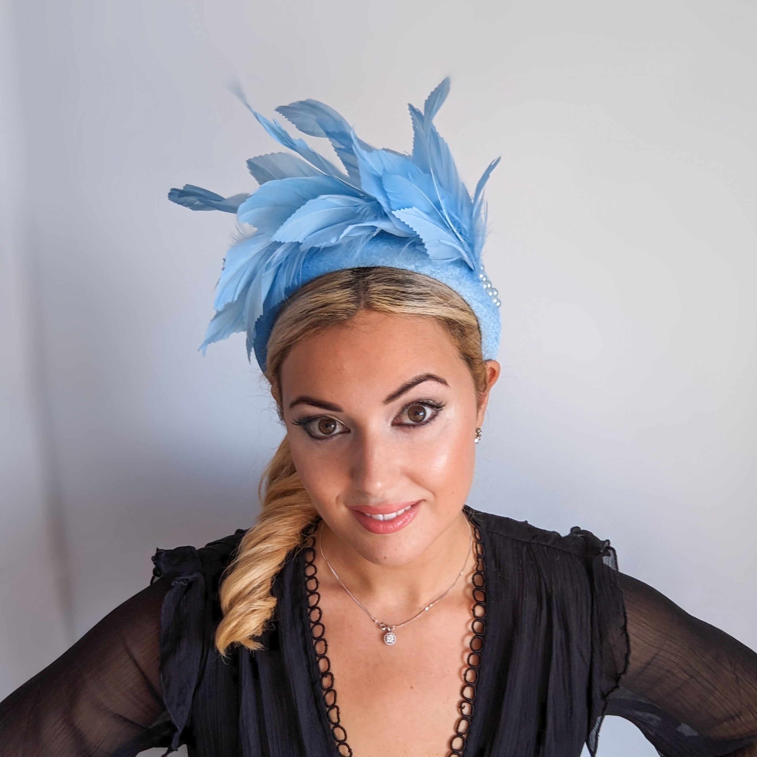 Light cornflower blue feather padded velvet headband fascinator Light cornflower blue feather padded velvet headband fascinator