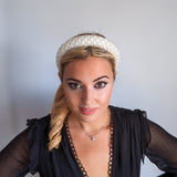 White beaded pearl padded headband fascinator White beaded pearl padded headband fascinator