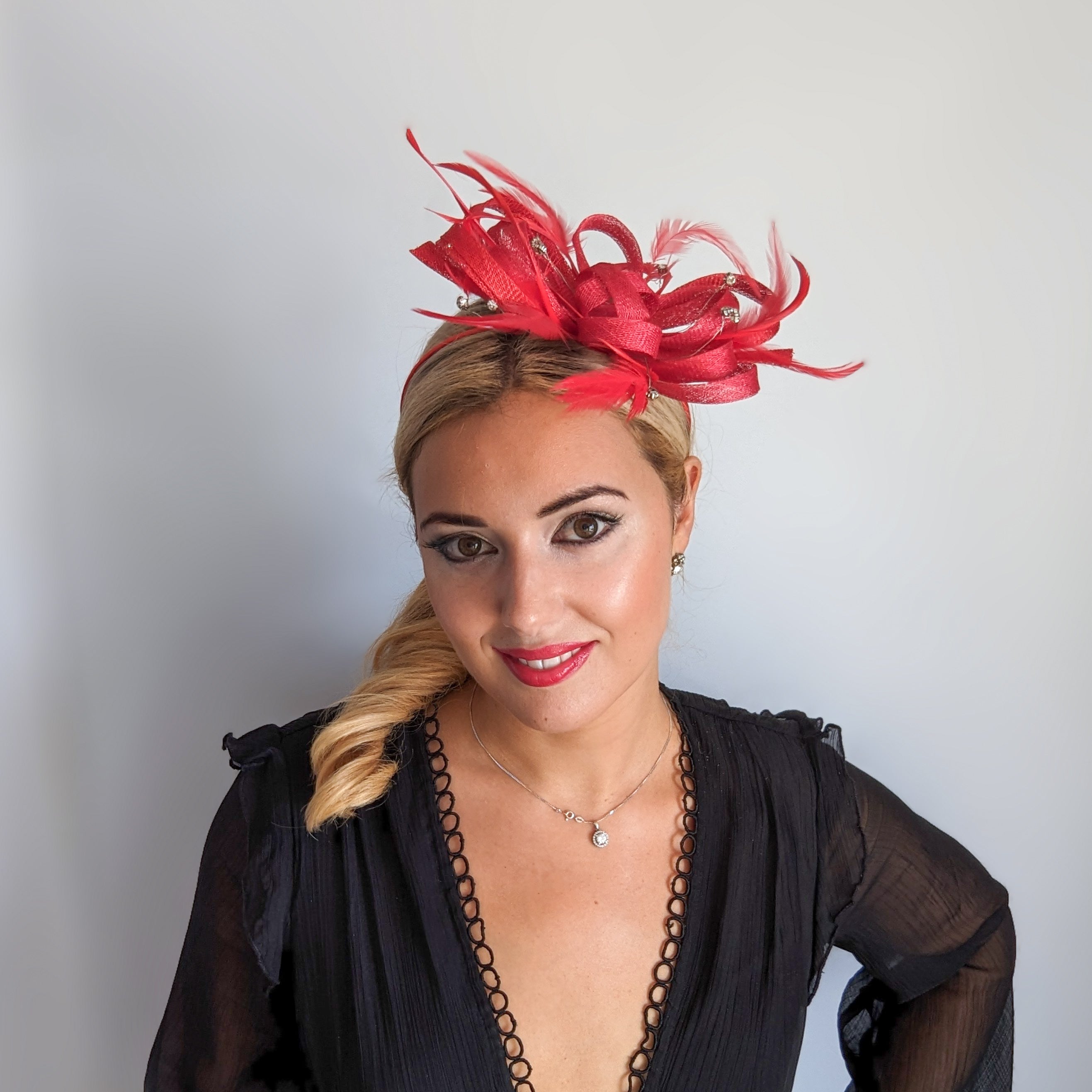 Red crystal feather fascinator hat Red crystal feather fascinator hat