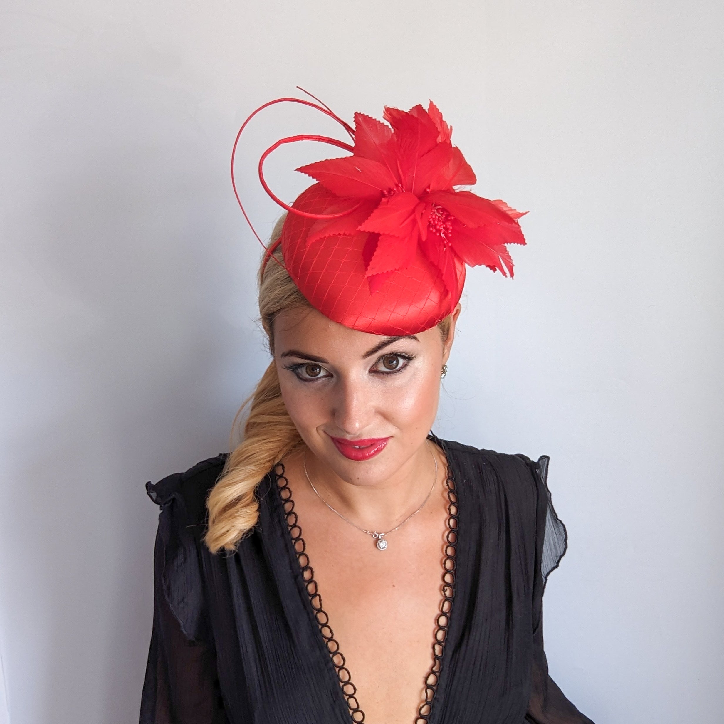 Red feather satin fascinator hat