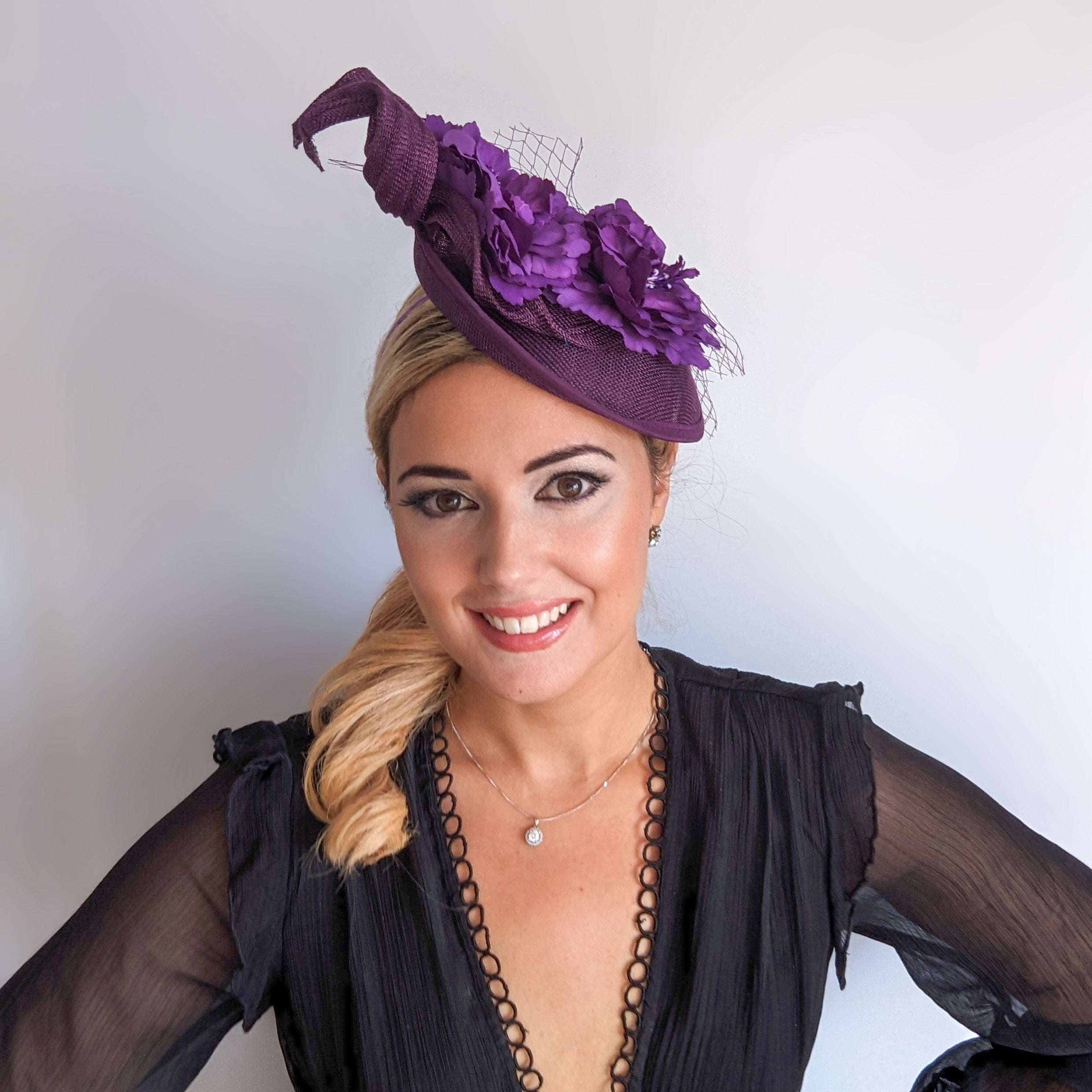 Dark plum purple flower fascinator disc saucer hat Dark plum purple flower fascinator disc saucer hat