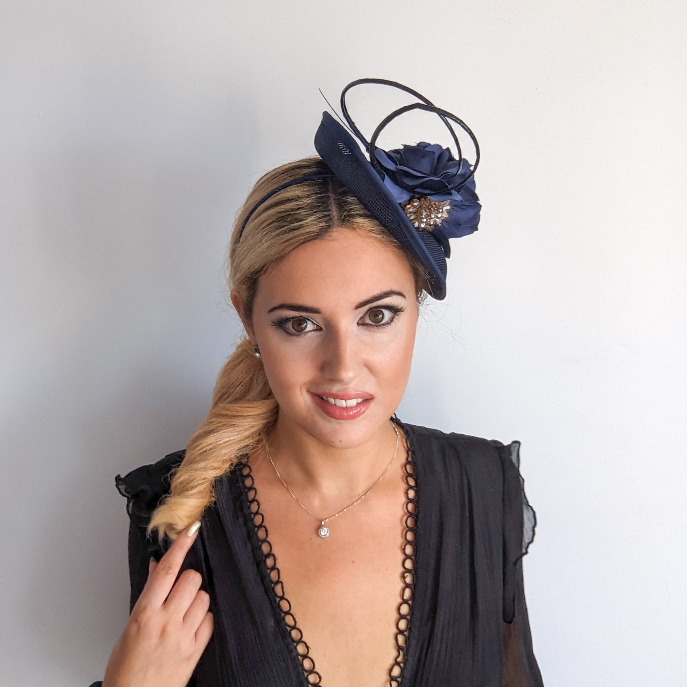 Navy blue flower disc saucer fascinator hat Navy blue flower disc saucer fascinator hat