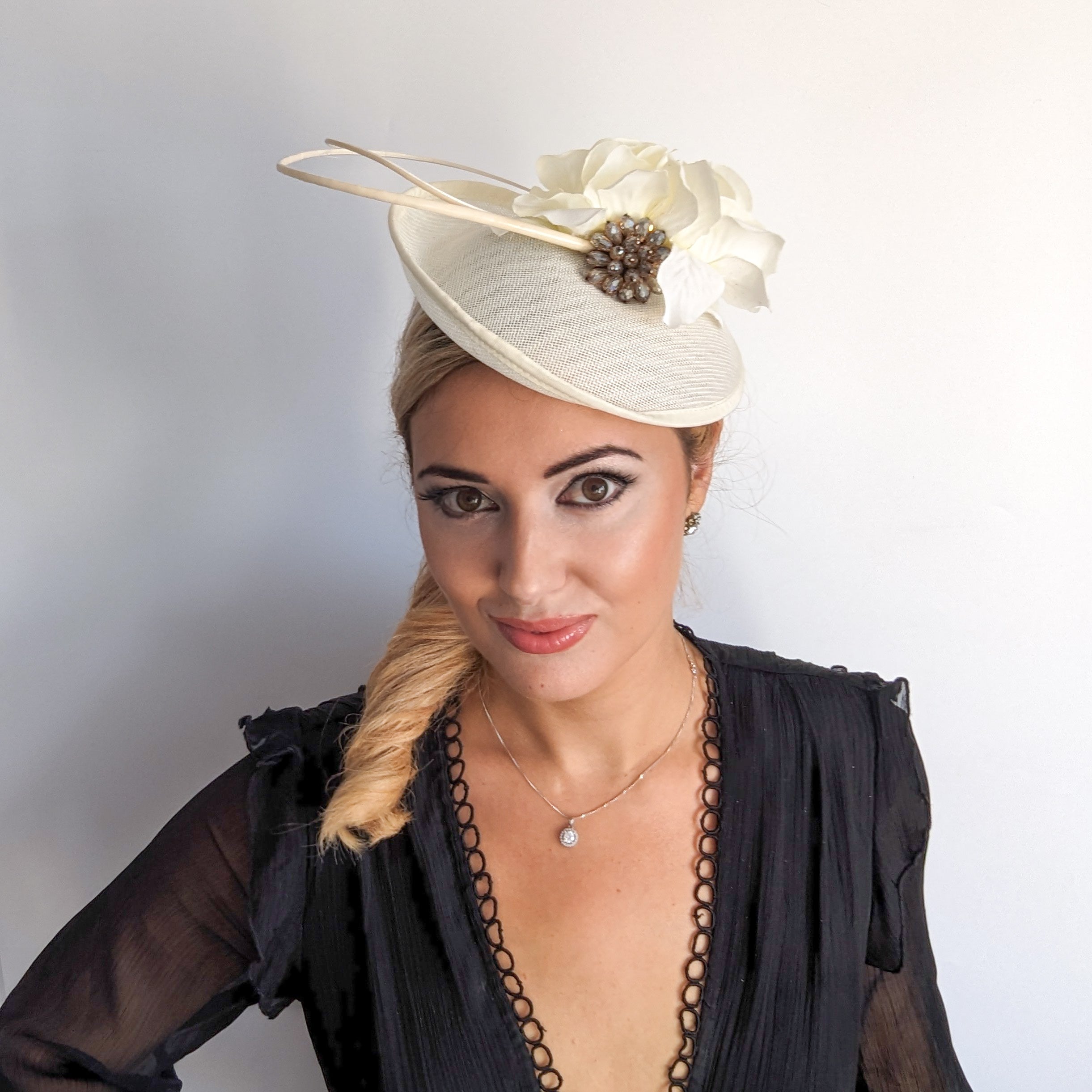 Cream flower disc saucer fascinator hat Cream flower disc saucer fascinator hat