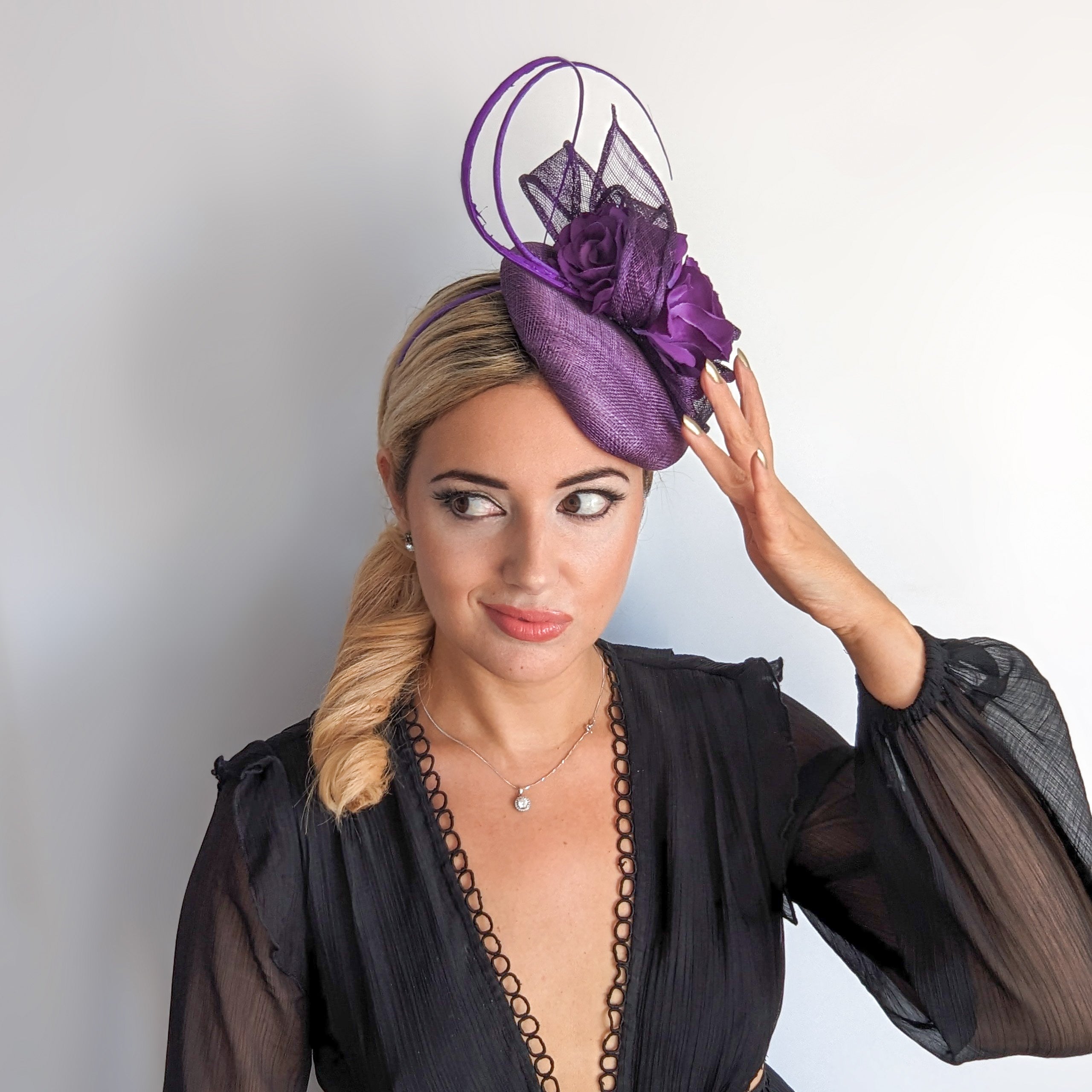 Aubergine royal purple flower fascinator hat Aubergine royal purple flower fascinator hat