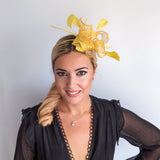 Yellow feather fascinator hat Yellow feather fascinator hat
