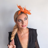 Orange crystal feather fascinator hat Orange crystal feather fascinator hat