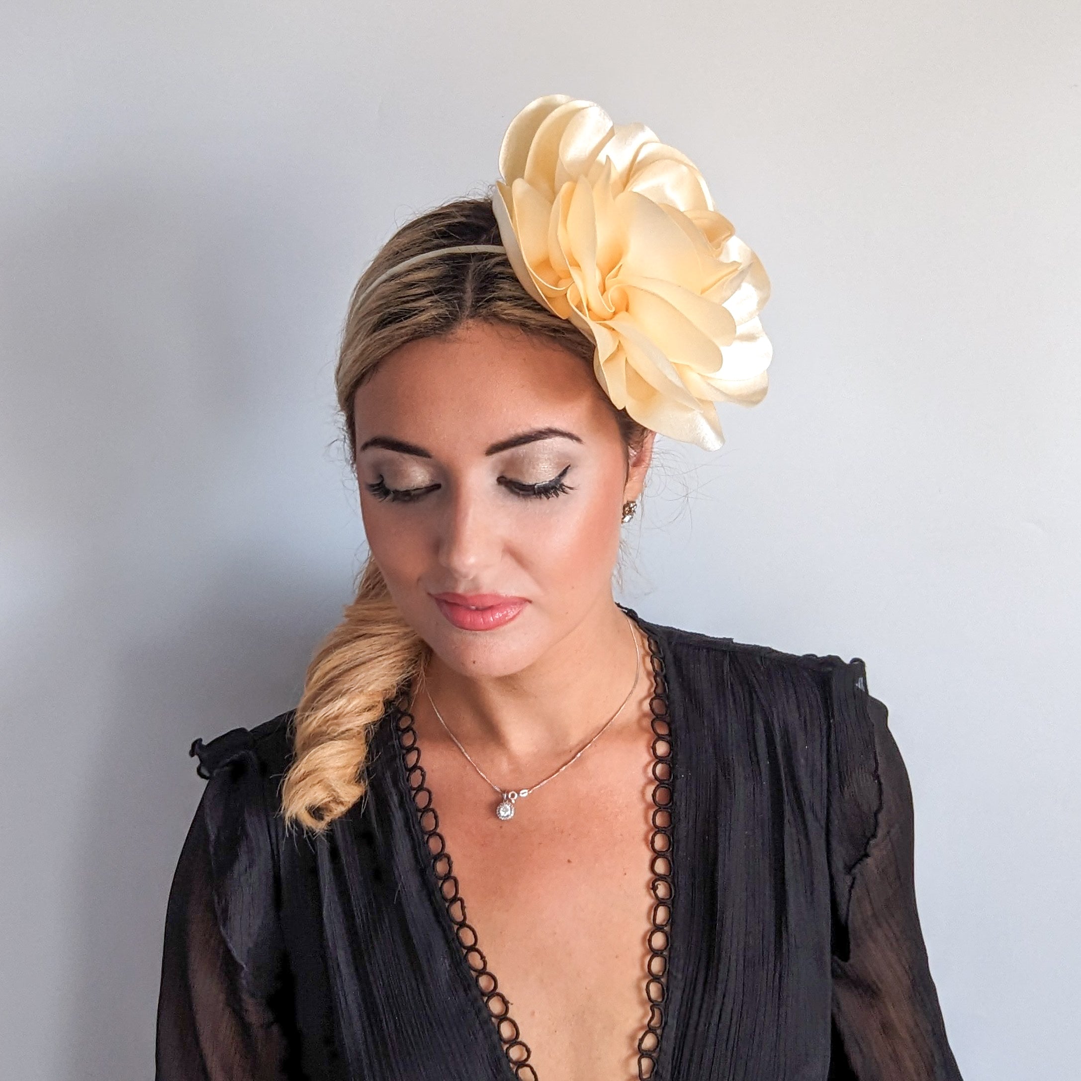Large cream satin rose fascinator hat Large cream satin rose fascinator hat