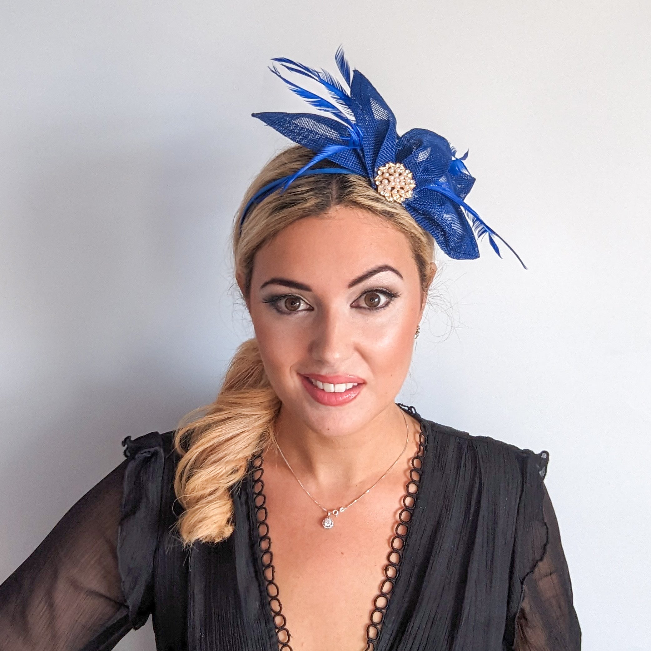 Royal cobalt blue feather petal fan fascinator hat Royal cobalt blue feather petal fan fascinator hat