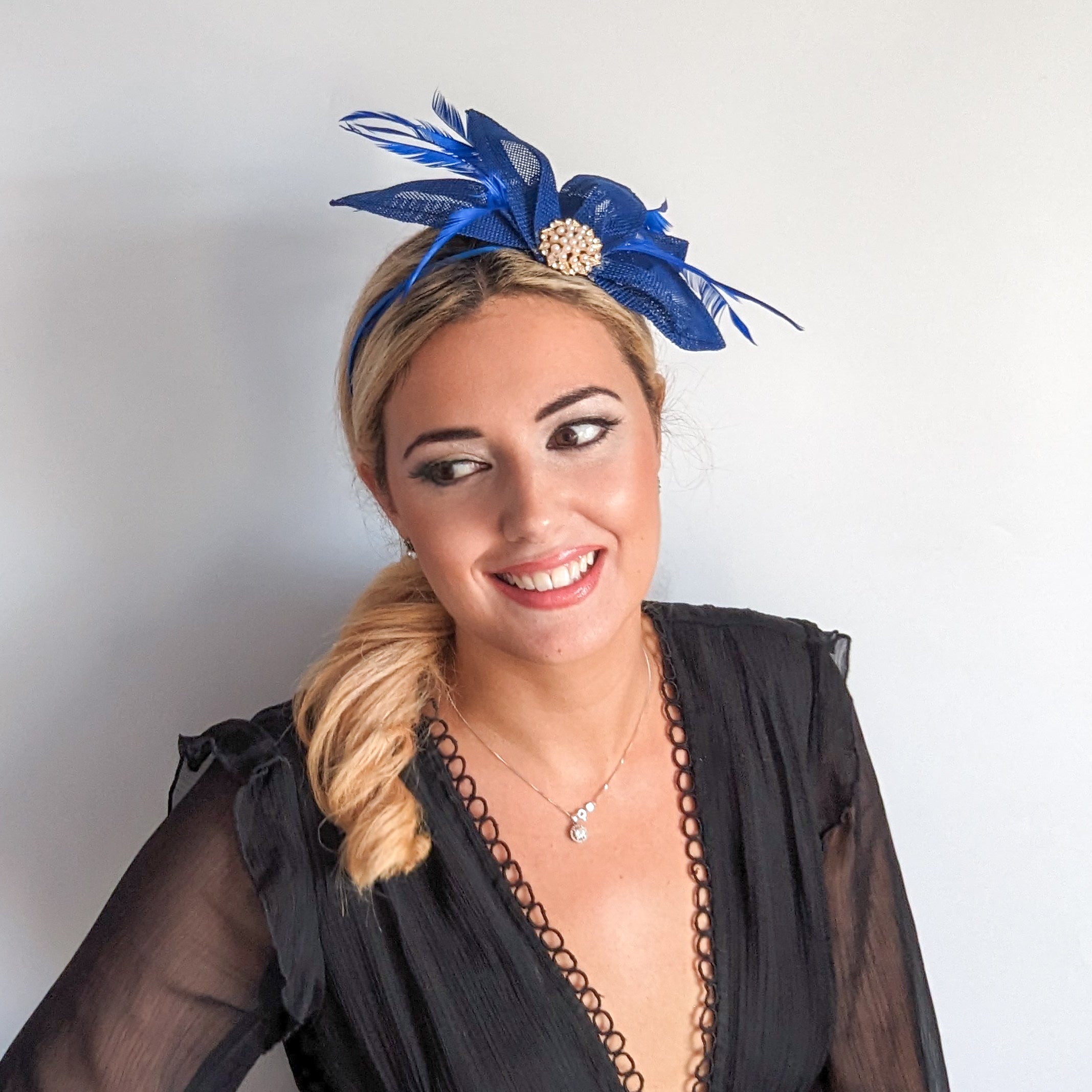 Royal cobalt blue feather petal fan fascinator hat Royal cobalt blue feather petal fan fascinator hat