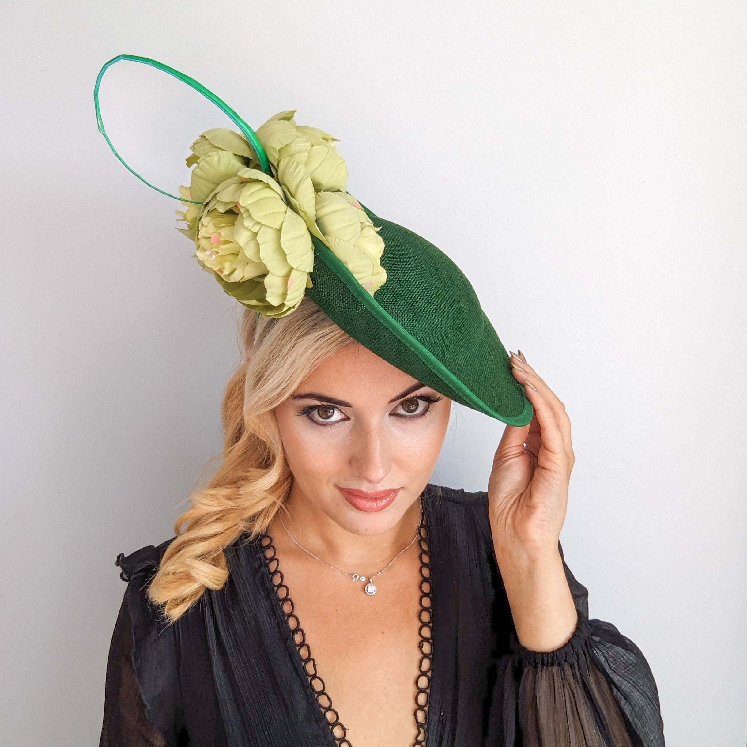 Emerald green large flower saucer disc fascinator hat Emerald green large flower saucer disc fascinator hat