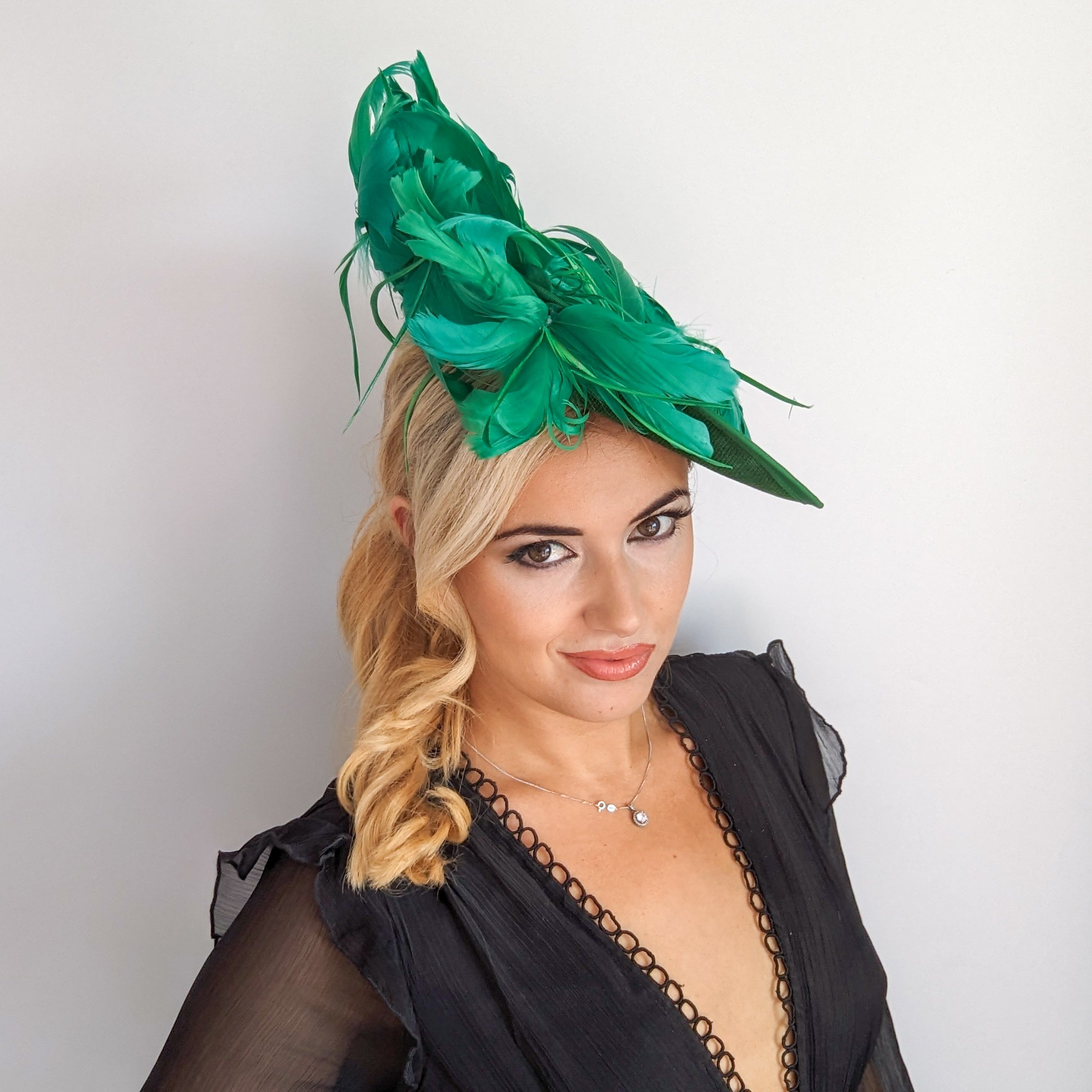 Emerald green feather large saucer disc fascinator hat Emerald green feather large saucer disc fascinator hat