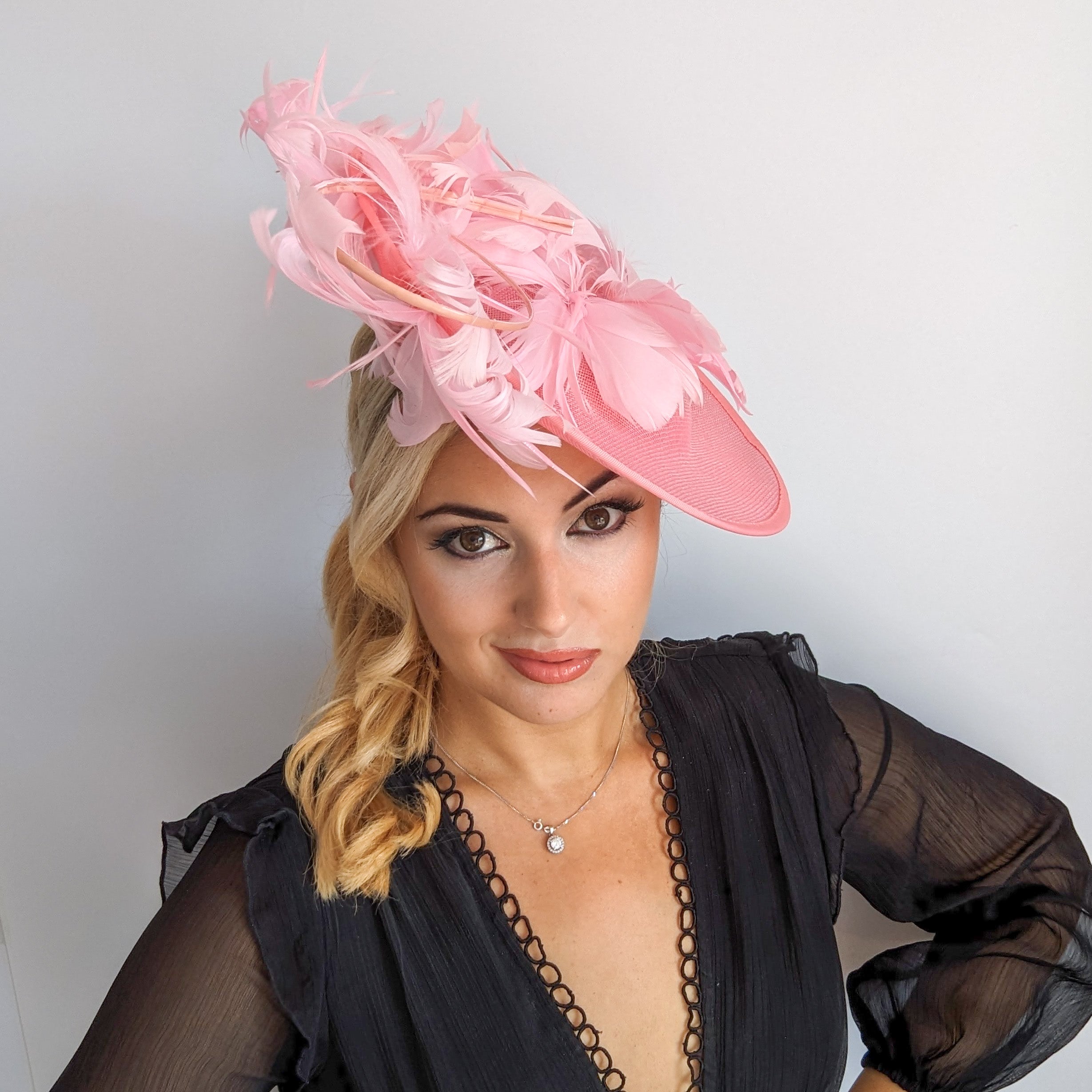 Pink large feather saucer disc fascinator hat Pink large feather saucer disc fascinator hat